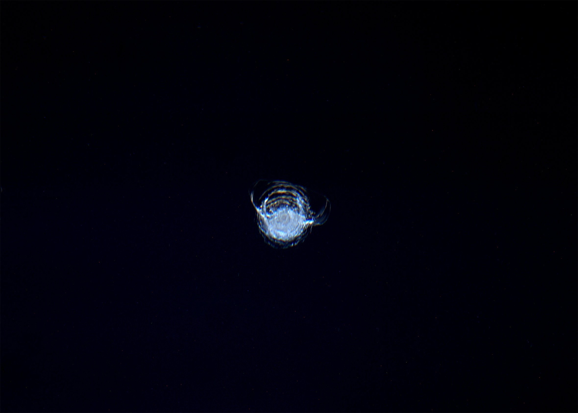 Image of the circular chip in the window of the ISS Image of the circular chip in the window of the ISS